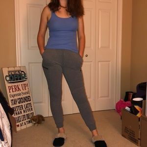 light blue tank top (s) and grey joggers (s)